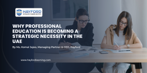 Professional women engaged in focused learning and discussion at a desk, representing professional education and continuous learning in the UAE, featured for Hayford Integrated Training Institute.